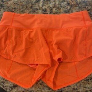 Lululemon orange shorts size 6 speed short womens 2.5 like new